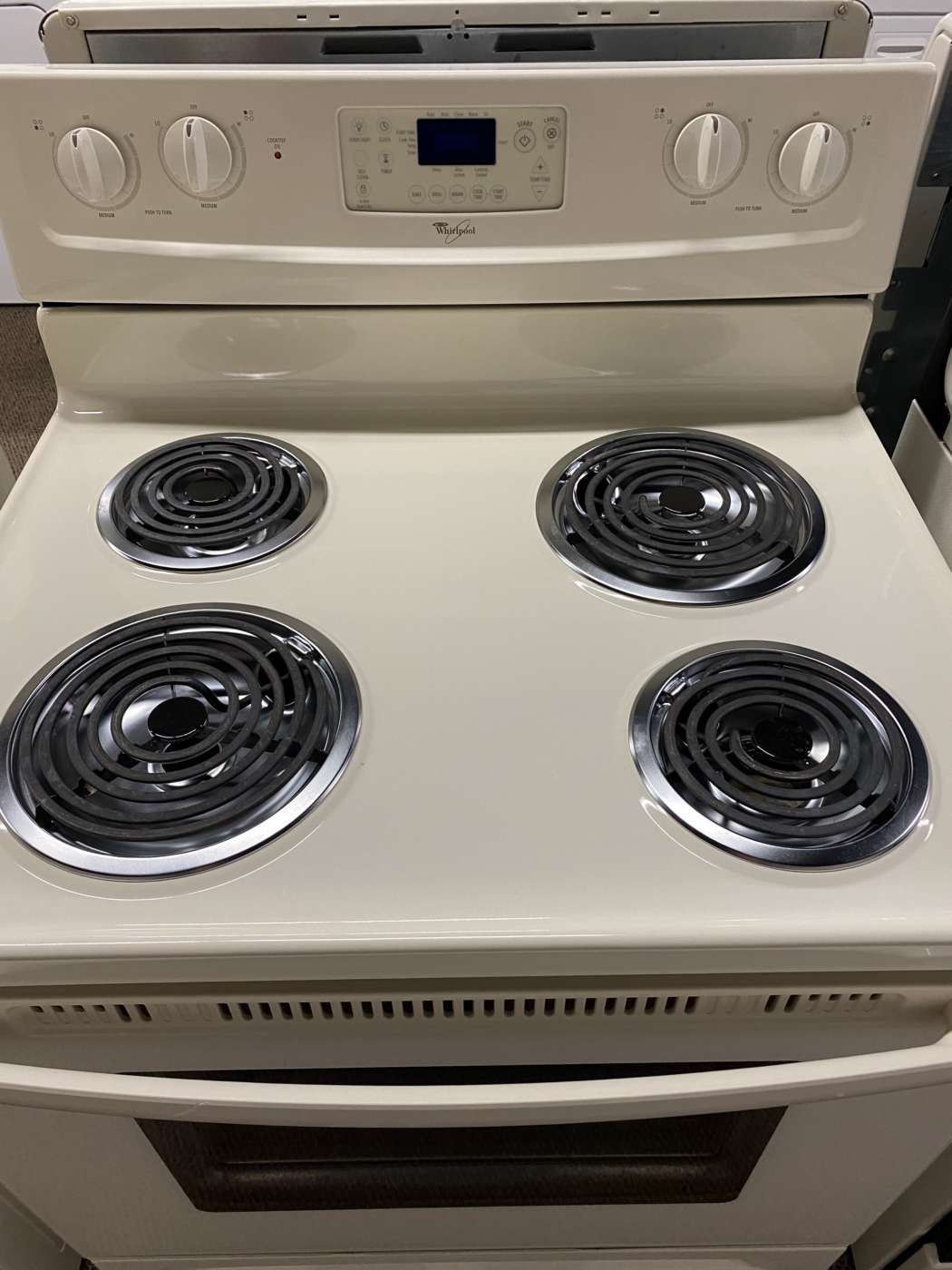 Reconditioned WHIRLPOOL SelfClean Electric Range Bisque Howie Voigt